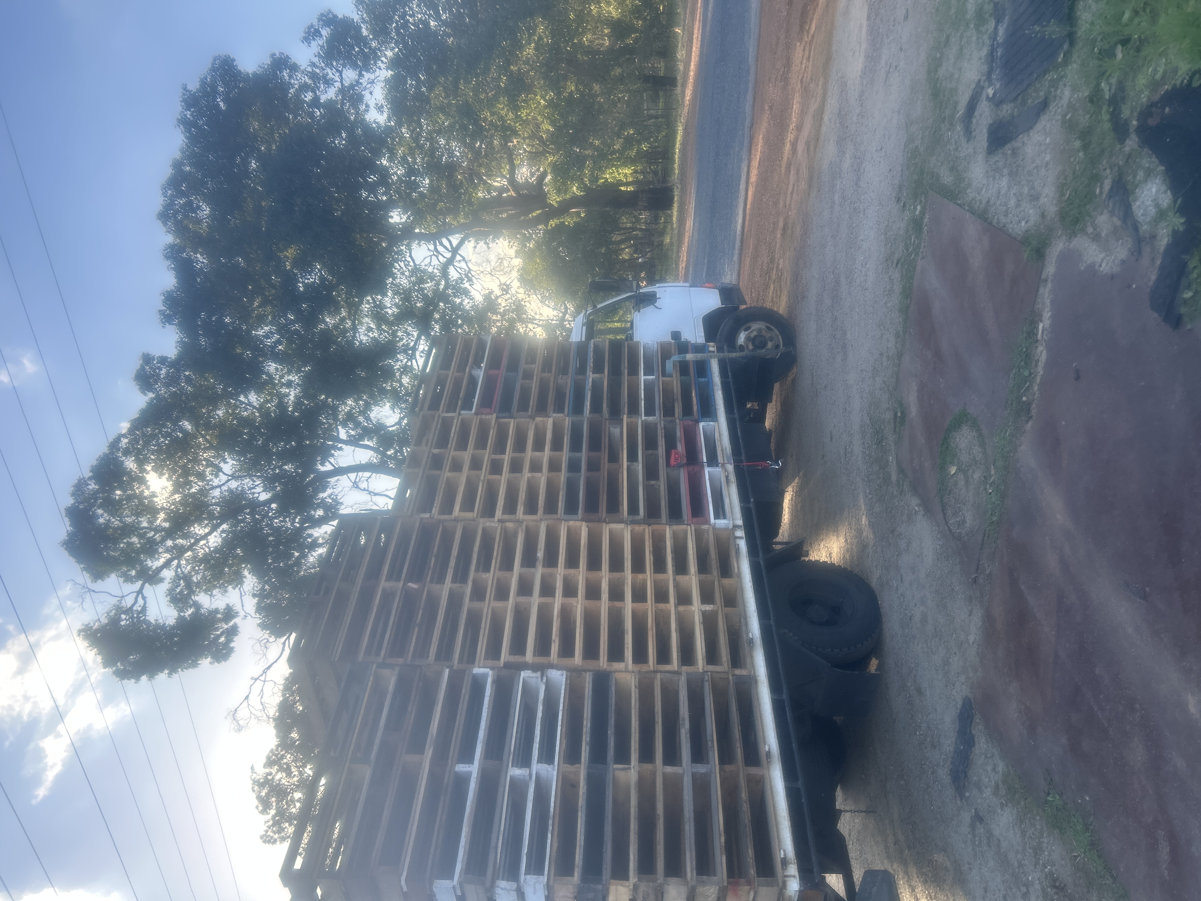 Real truckload of recycled wooden pallets